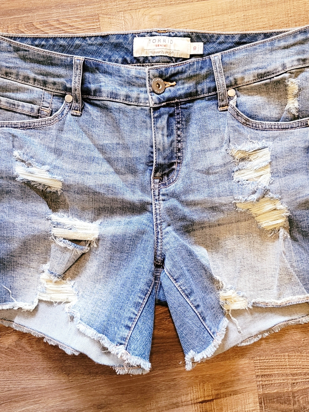 torrid light blue distressed jean shorts